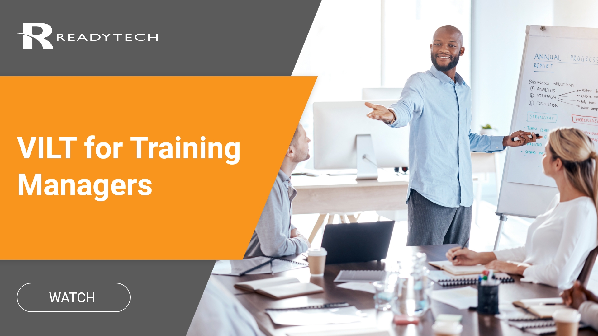 Training Manager standing in front of a group of instructors